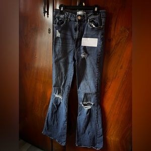 Dark wash. High rise flare. Size 5.